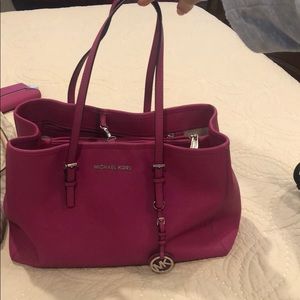 Michael Kors Pink purse with matching wallet